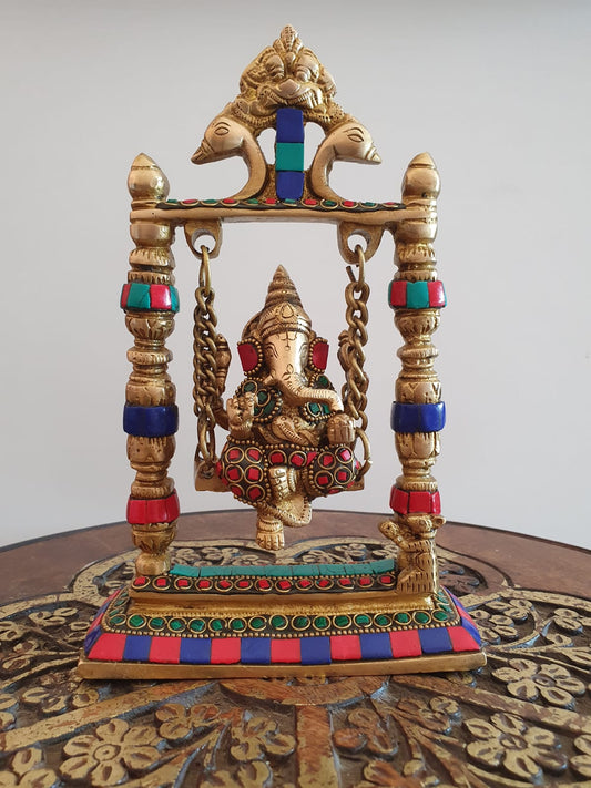 Ganesh Sitting on Swing with Stone Work (9 In)